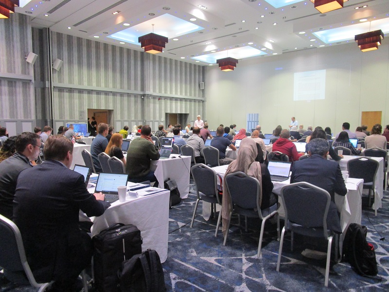 an image of an educational talk from the side of the room