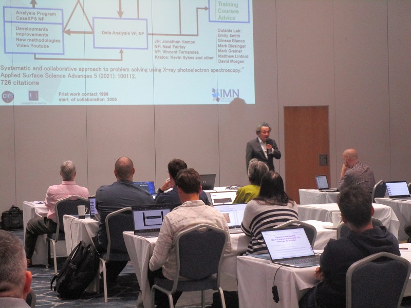 an image of an speaker at an educational talk